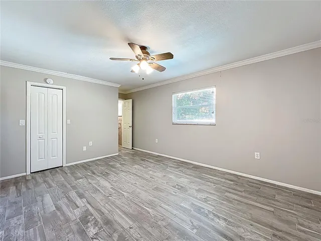 a view of an empty room with a window