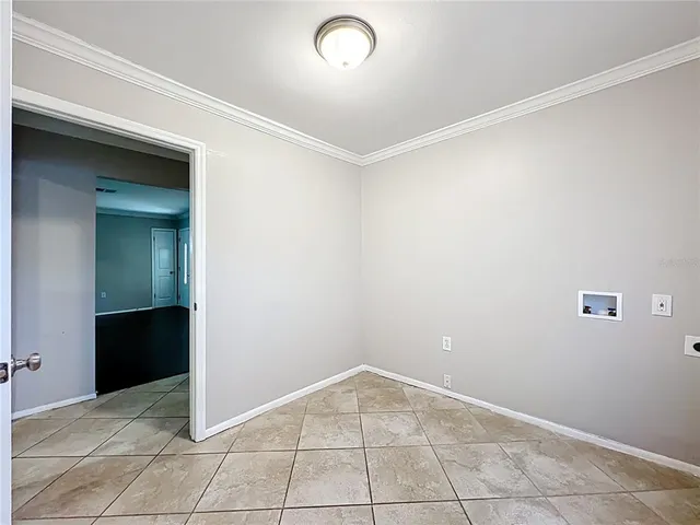 an empty room with cabinets