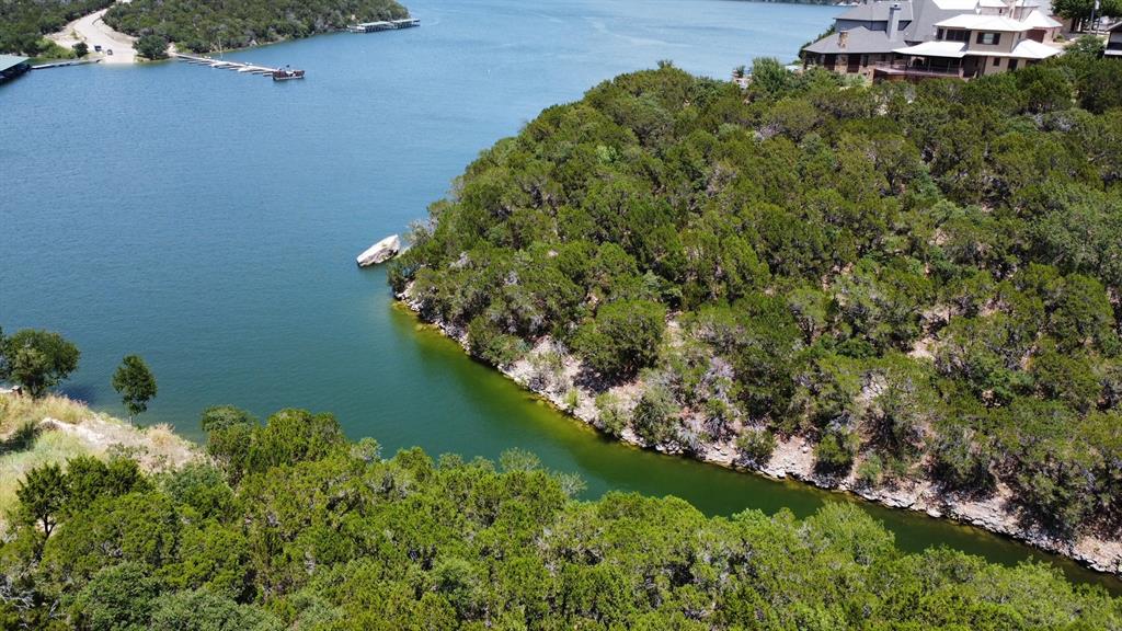 1010 Cliffs Drive Graford, TX 76449 - Photo 4 of 13 a view of a lake with a yard