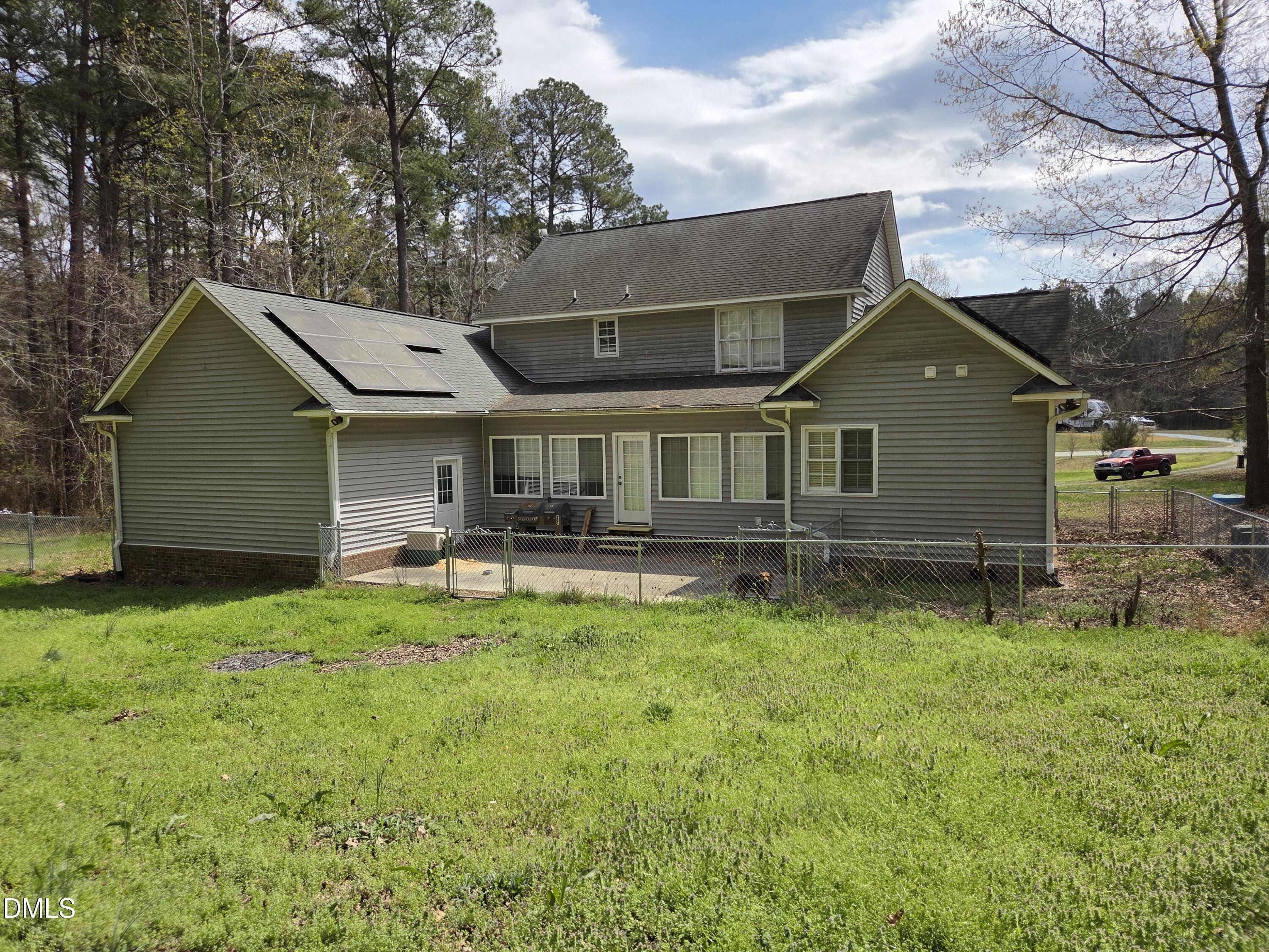 3001 Hidden Spring Lane Oxford, NC 27565 - Photo 11 of 57 a front view of a house with yard and green space