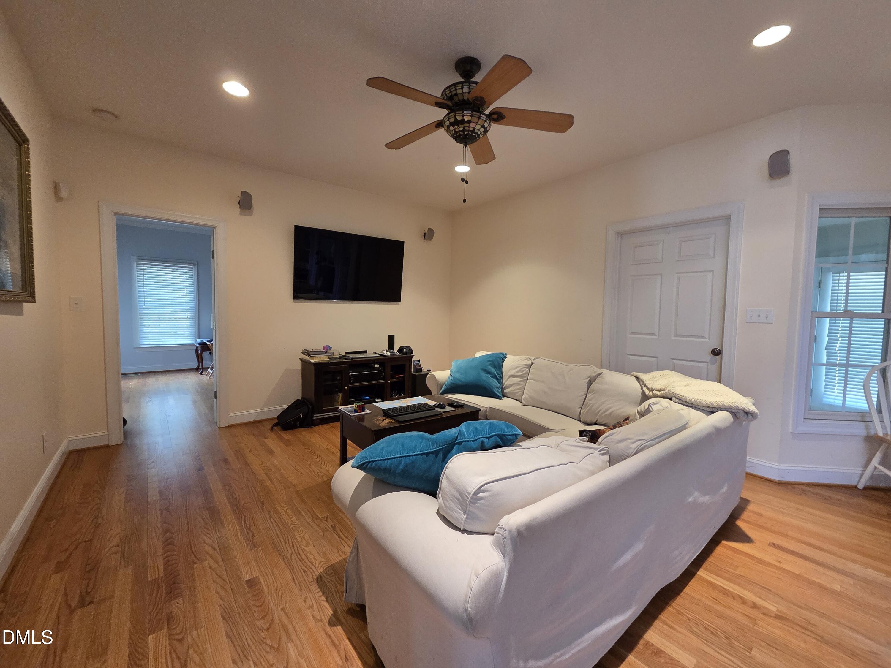 3001 Hidden Spring Lane Oxford, NC 27565 - Photo 16 of 57 a living room with furniture and a flat screen tv
