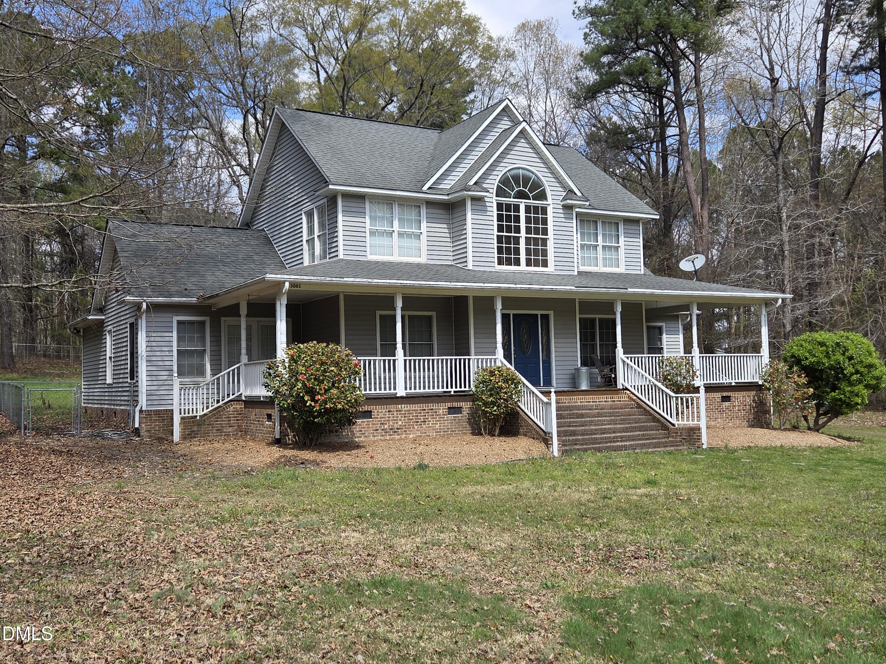 3001 Hidden Spring Lane Oxford, NC 27565 - Photo 2 of 57 a front view of a house with yard and porch