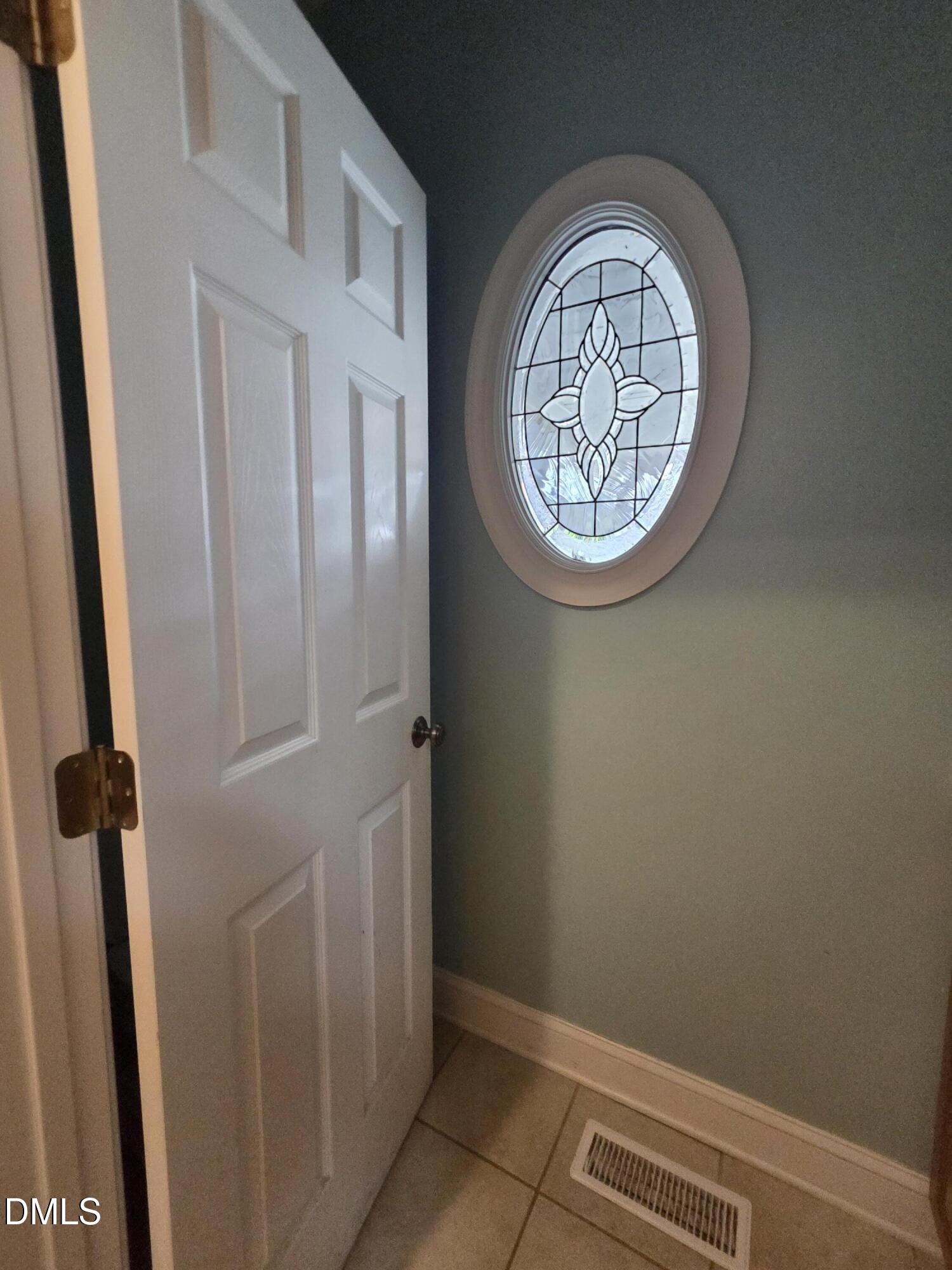 3001 Hidden Spring Lane Oxford, NC 27565 - Photo 31 of 57 an empty room with a window