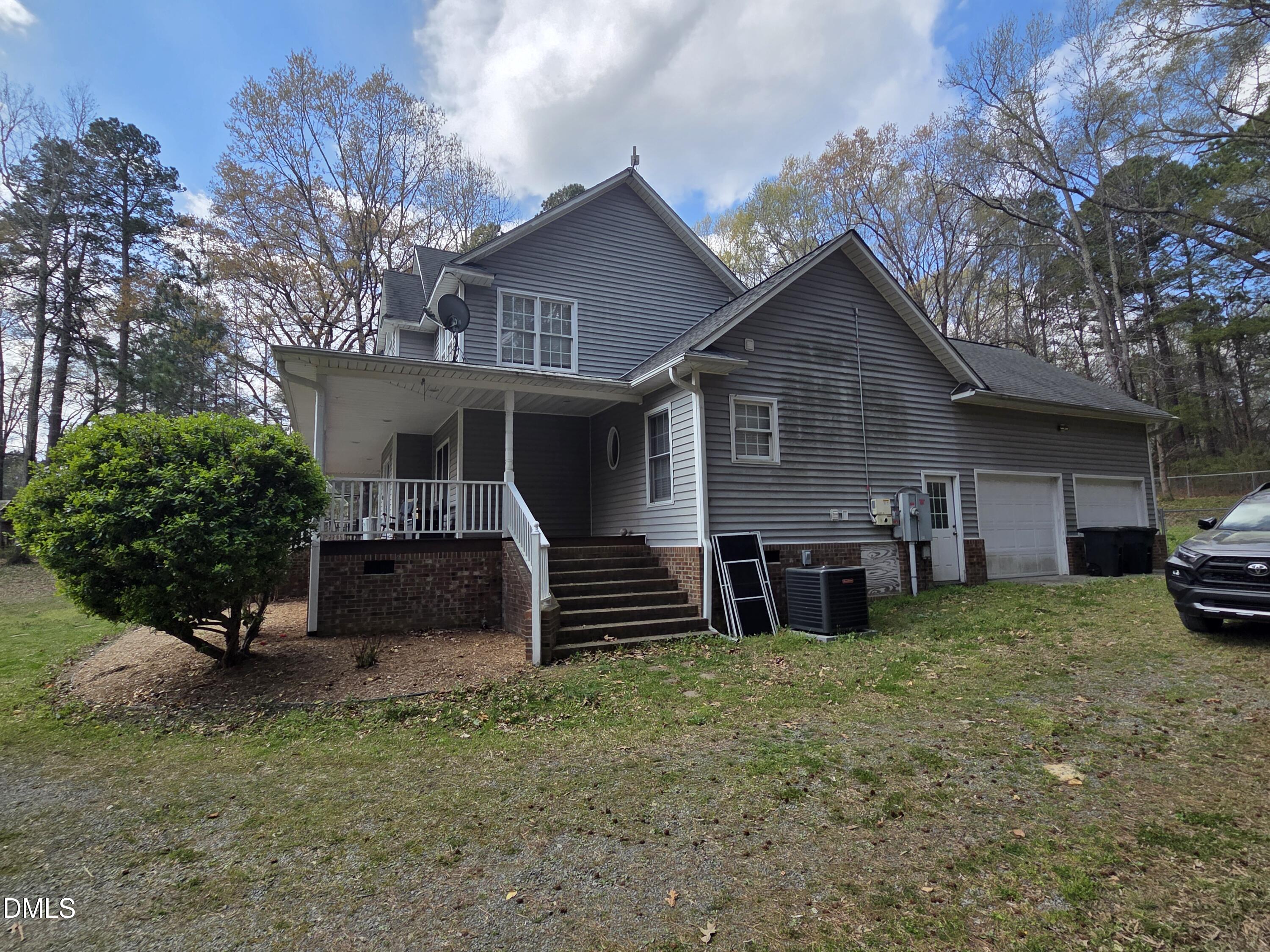 3001 Hidden Spring Lane Oxford, NC 27565 - Photo 4 of 57 a view of a house with a yard and roof