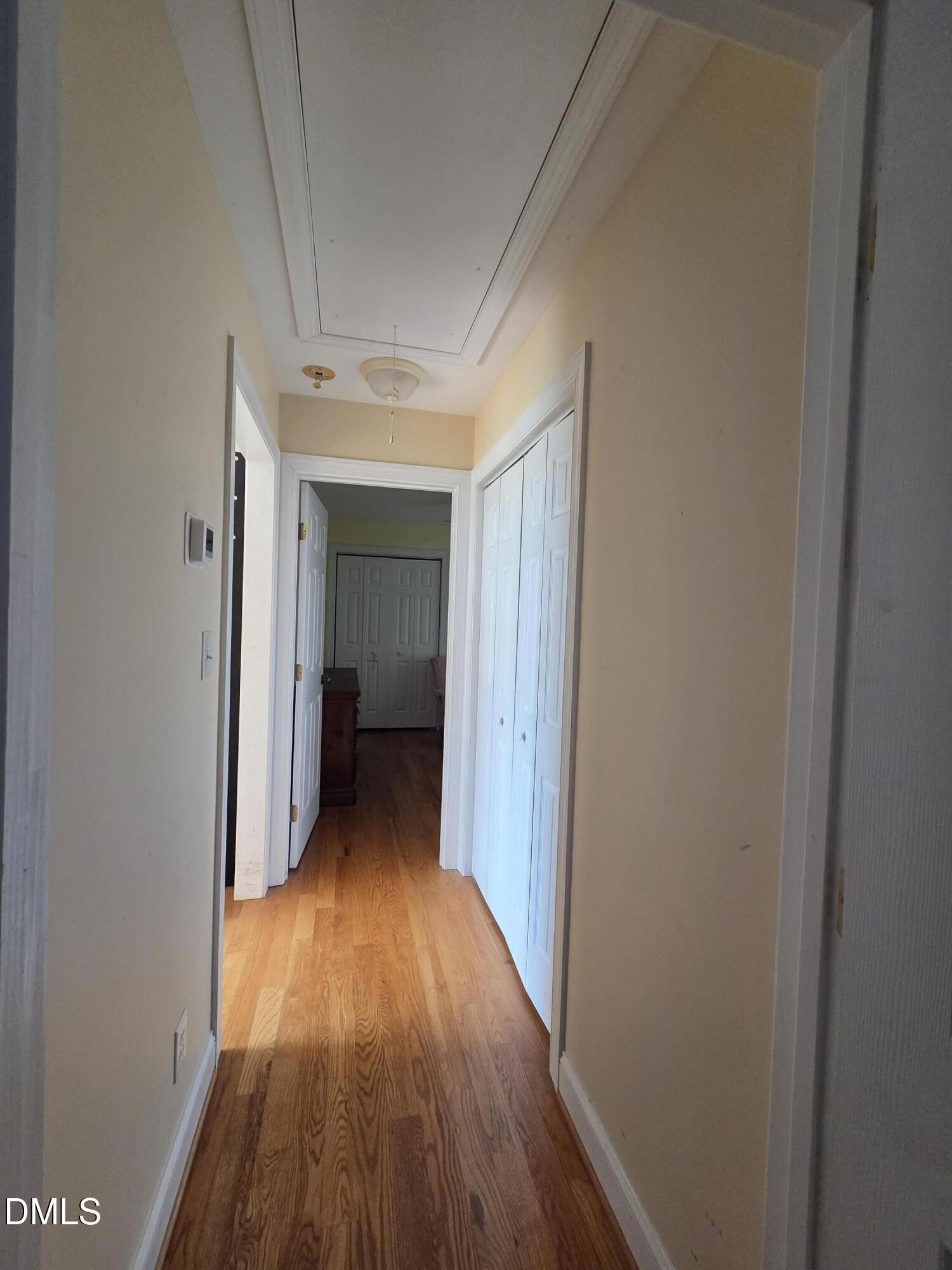 3001 Hidden Spring Lane Oxford, NC 27565 - Photo 48 of 57 a view of a hallway with wooden floor