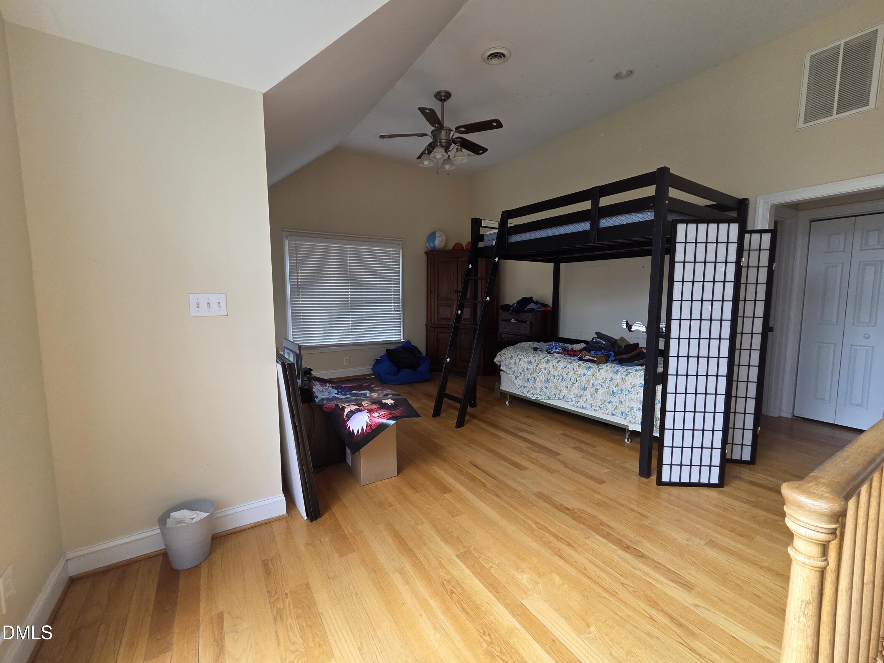3001 Hidden Spring Lane Oxford, NC 27565 - Photo 51 of 57 a bedroom with a bed and a mirror