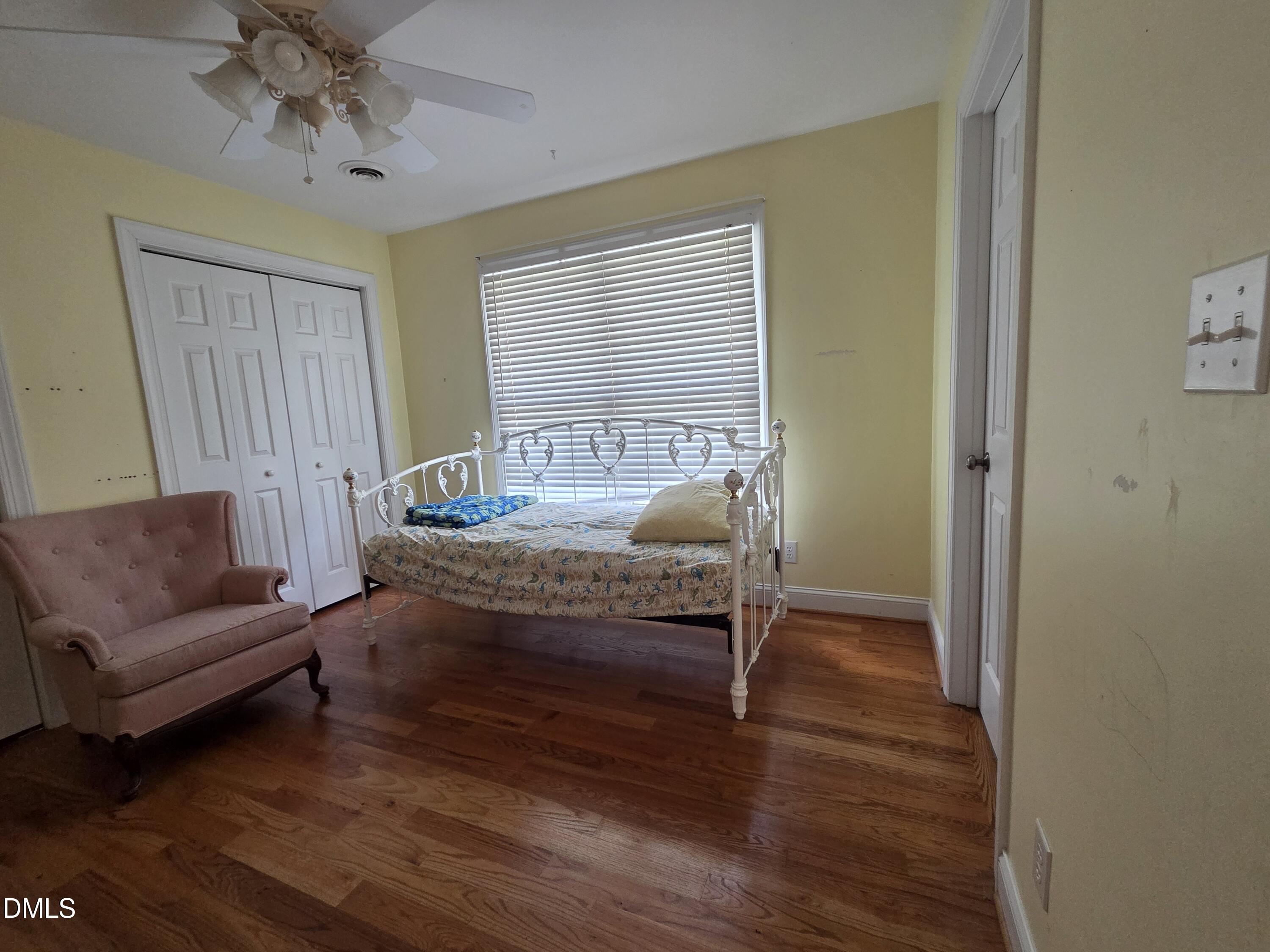 3001 Hidden Spring Lane Oxford, NC 27565 - Photo 53 of 57 a bedroom with a bed and a couch