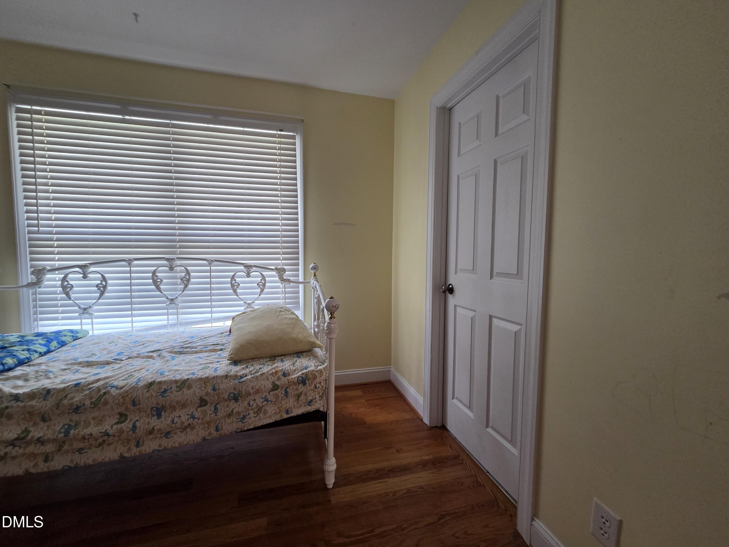 3001 Hidden Spring Lane Oxford, NC 27565 - Photo 55 of 57 a bedroom with a bed and a window