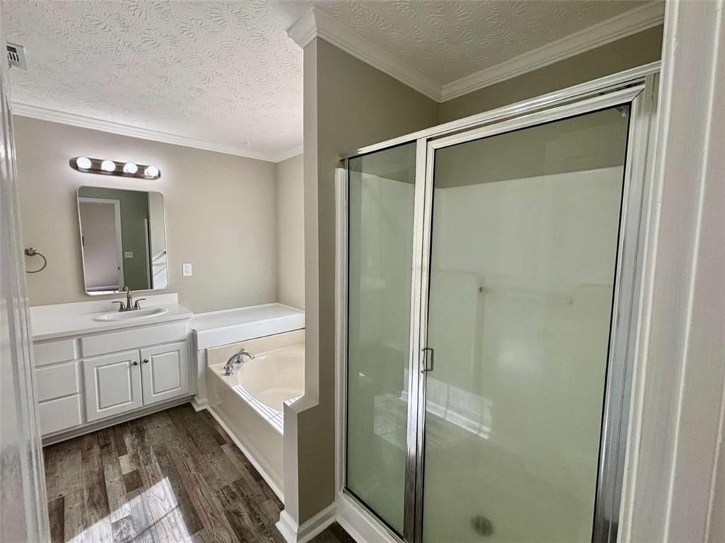 275 Thorn Brook Circle Bethlehem, GA 30620 - Photo 13 of 32 a bathroom with a tub sink and mirror