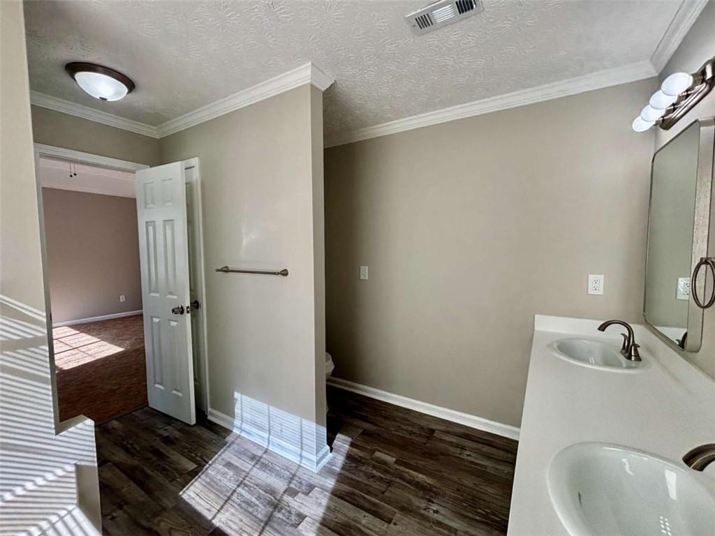 275 Thorn Brook Circle Bethlehem, GA 30620 - Photo 15 of 32 a bathroom with a sink and a mirror