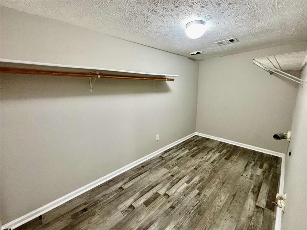 275 Thorn Brook Circle Bethlehem, GA 30620 - Photo 27 of 32 a view of a room with an empty space and a window