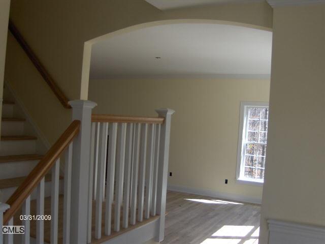 a view of a hallway with windows