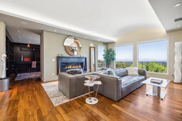 a room with furniture and a large window