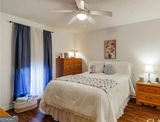 a bathroom with a sink mirror and a shower