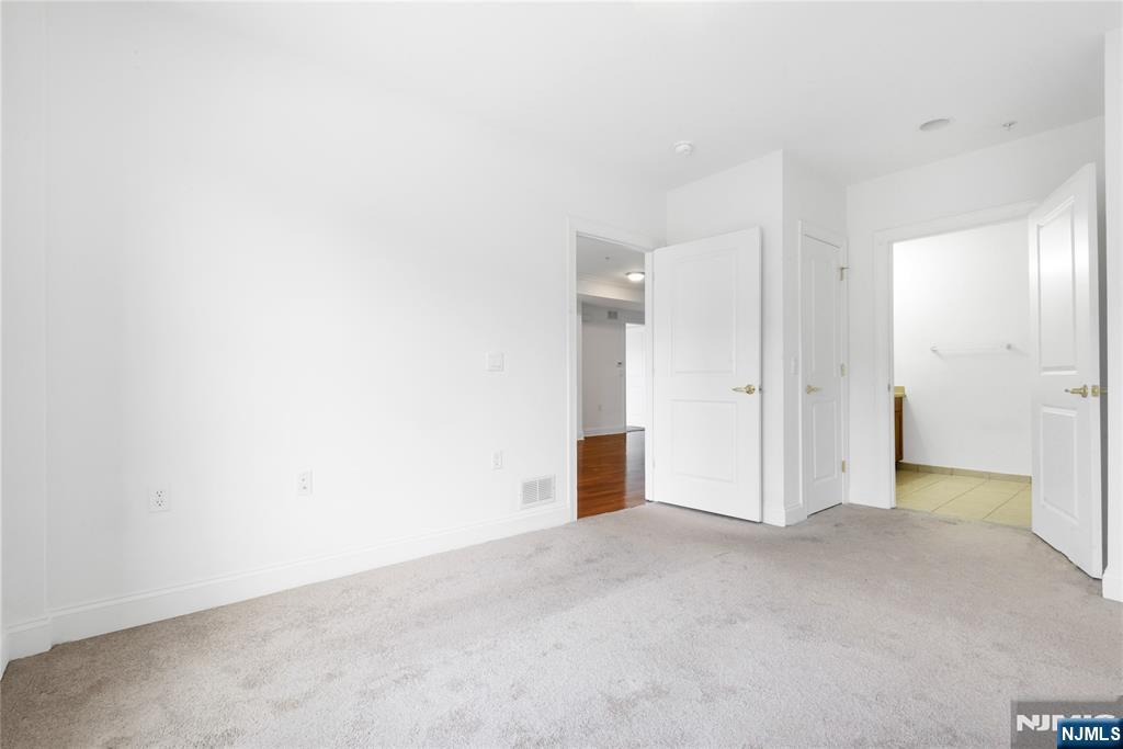 54 Polifly Road, Unit 311 Hackensack, NJ 07601 - Photo 14 of 20 a view of an empty room