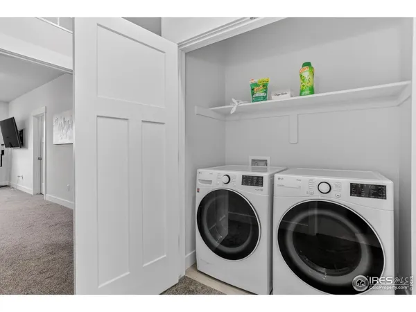 a view of washer and dryer in a utility room