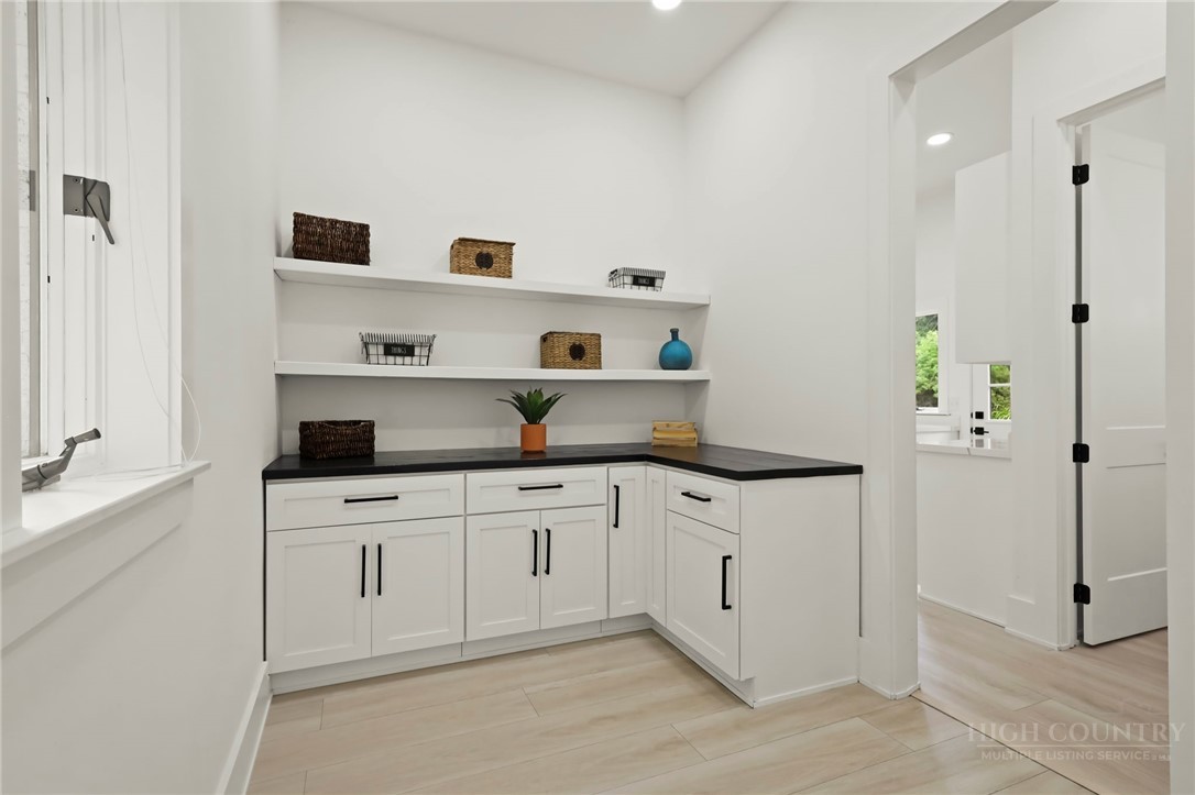 140 Wilson Ridge Road Boone, NC 28607 - Photo 22 of 48 a kitchen with white cabinets