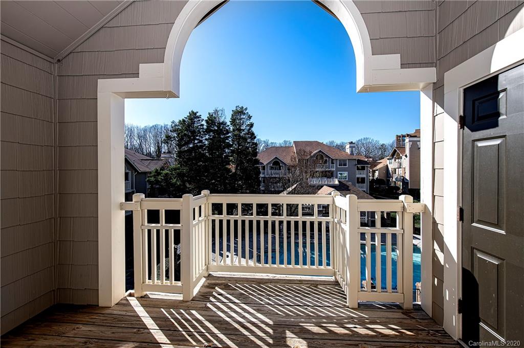 5003 Sharon Road, Unit R Charlotte, NC 28210 - Photo 20 of 23 a view of a house with a porch