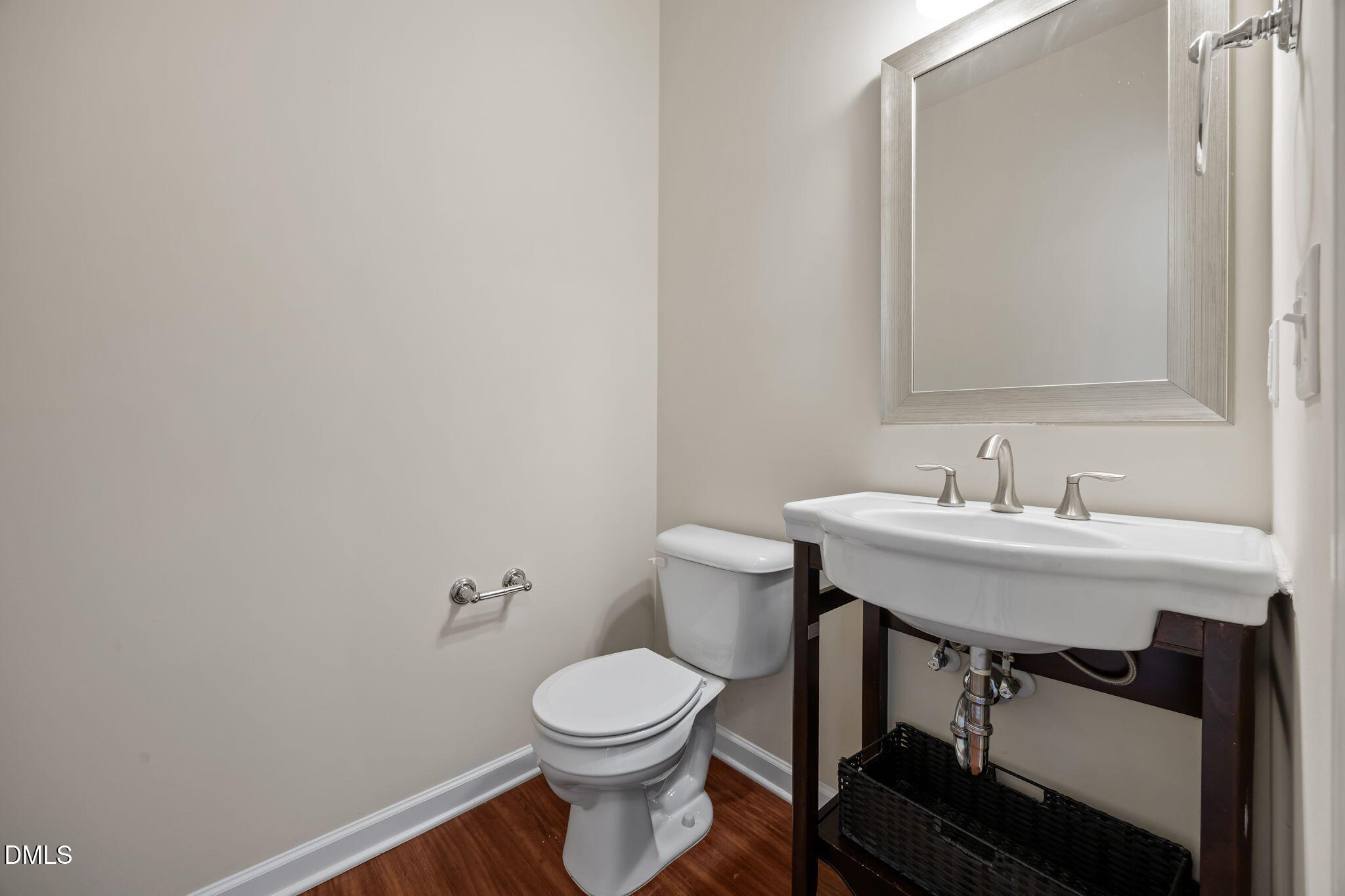 1005 Epiphany Road Morrisville, NC 27560 - Photo 10 of 23 a bathroom with a sink a toilet and mirror