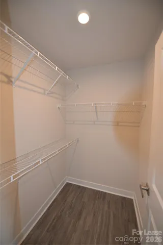 a view of a room with racks on the wall