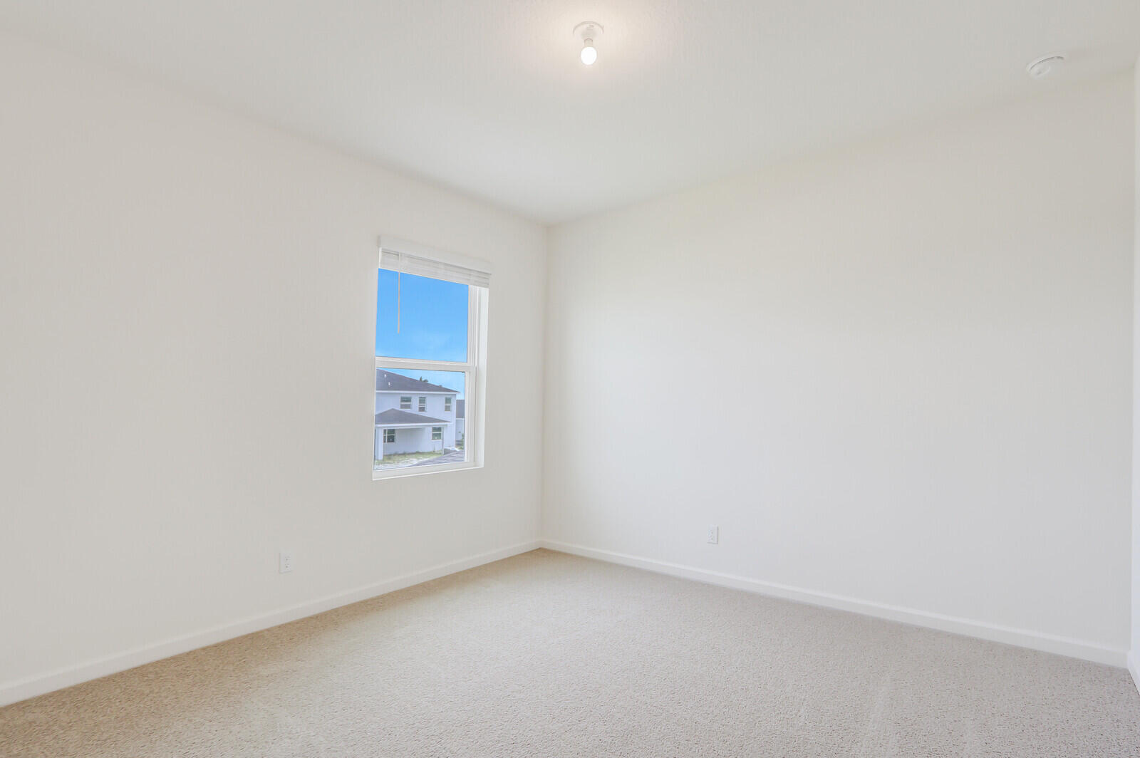 12335 Southwest Nettuno Way Port Port St. Lucie, FL 34987 - Photo 22 of 33 a view of an empty room