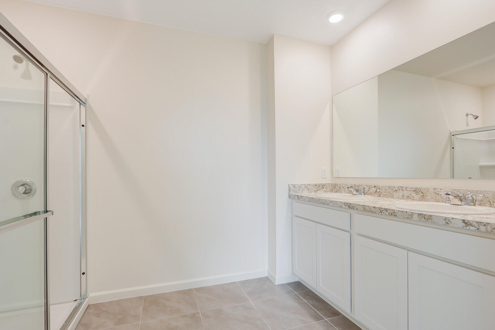 12335 Southwest Nettuno Way Port Port St. Lucie, FL 34987 - Photo 24 of 33 a bathroom with a granite countertop sink and a mirror