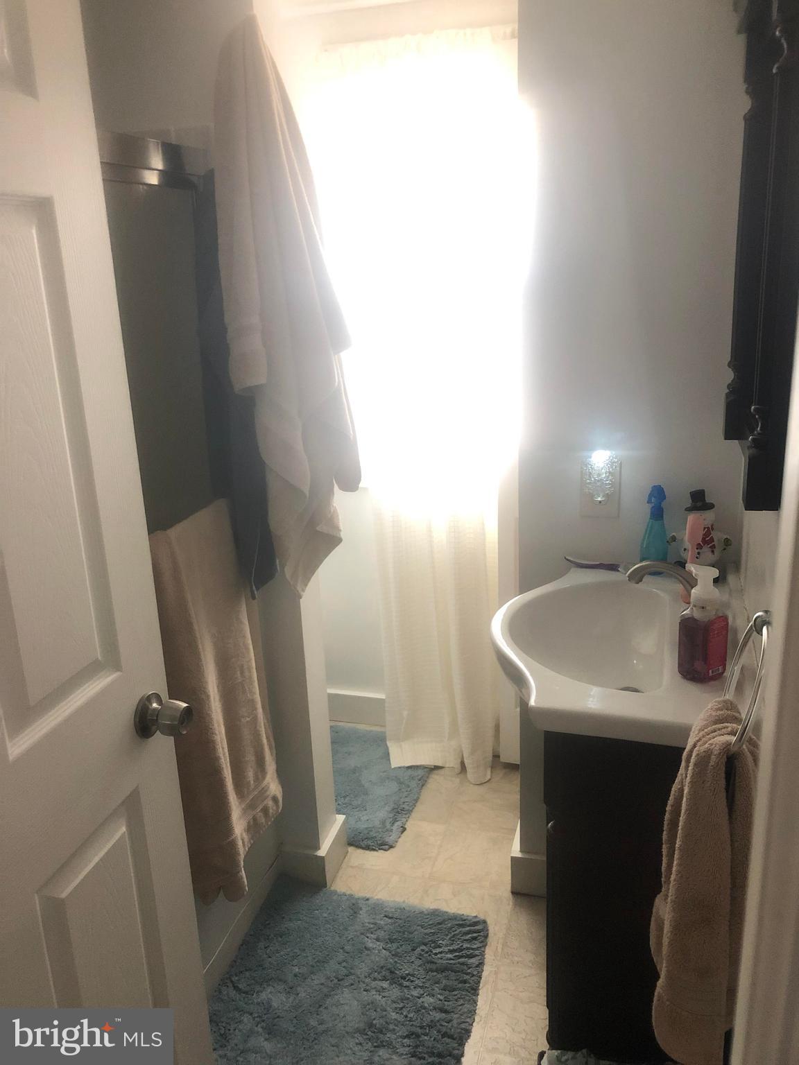 422 Bull Run Road Wrightsville, PA 17368 - Photo 17 of 46 a bathroom with a sink toilet and shower