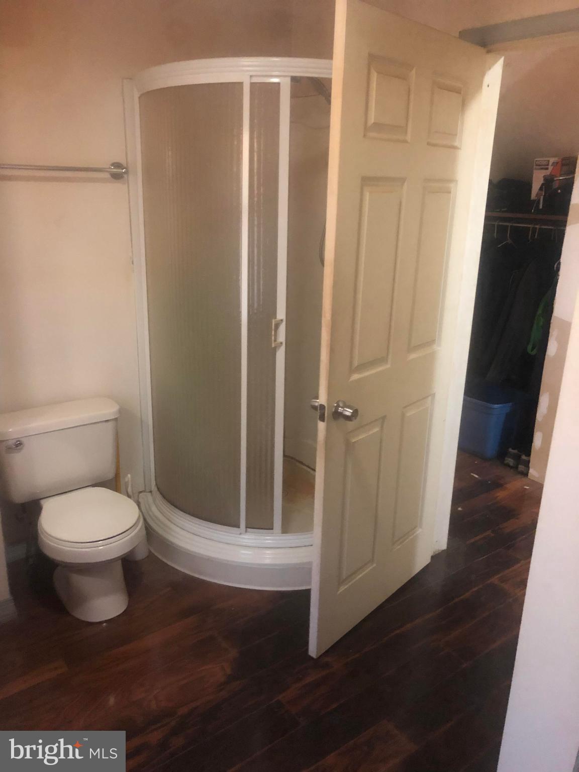 422 Bull Run Road Wrightsville, PA 17368 - Photo 19 of 46 a bathroom with a toilet and a shower