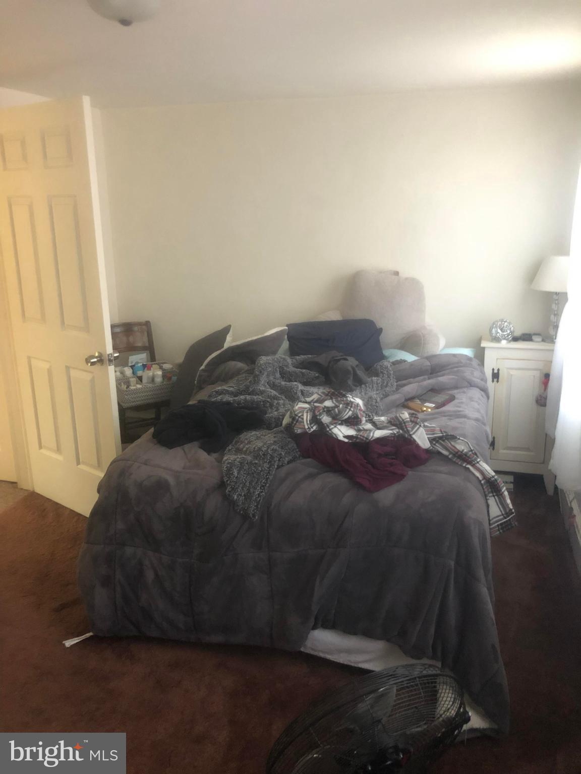 422 Bull Run Road Wrightsville, PA 17368 - Photo 25 of 46 a bed sitting in a bedroom next to a window