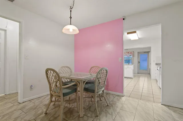 a view of a dining room with furniture