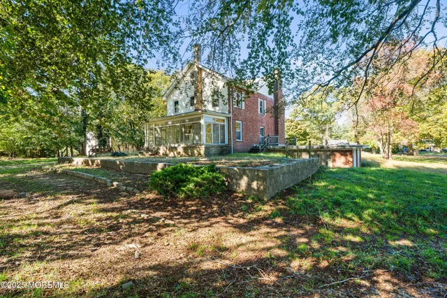 a view of balcony with a potted plant