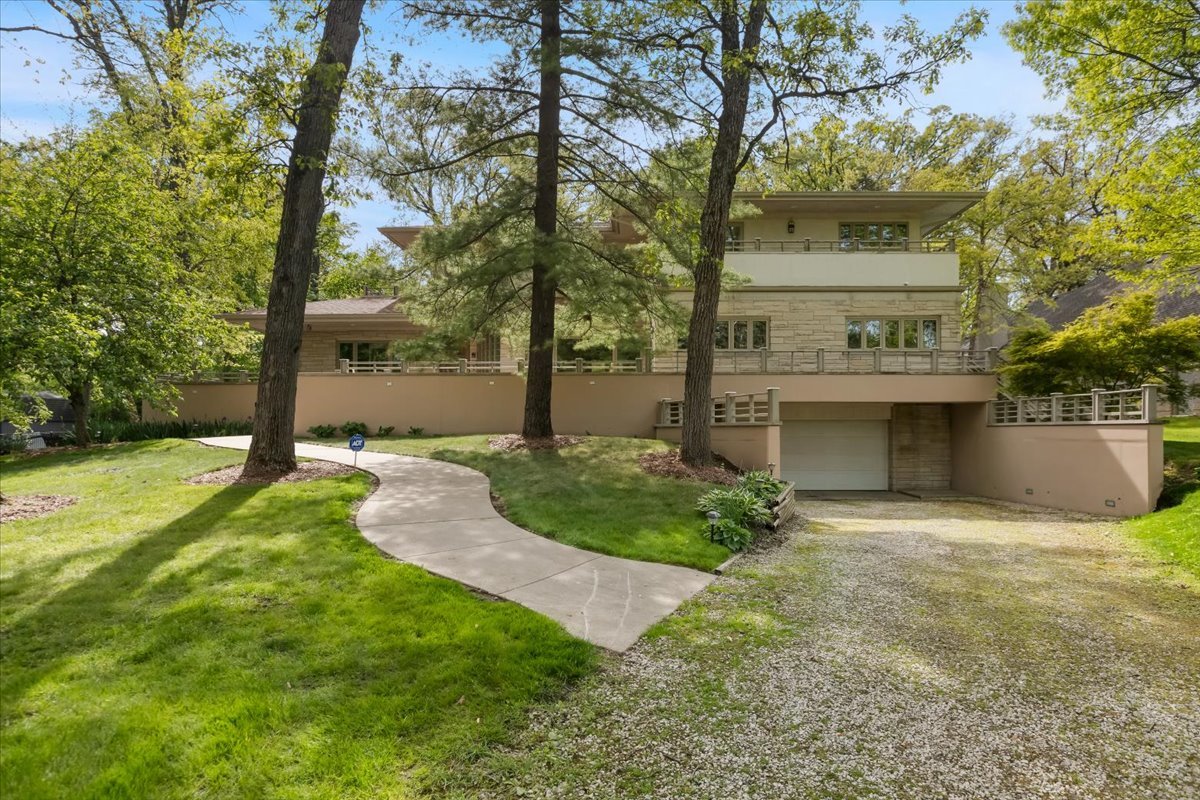 3464 Old Mill Road North Highland Park, IL 60035 - Photo 2 of 64 a view of a house with a yard and large tree