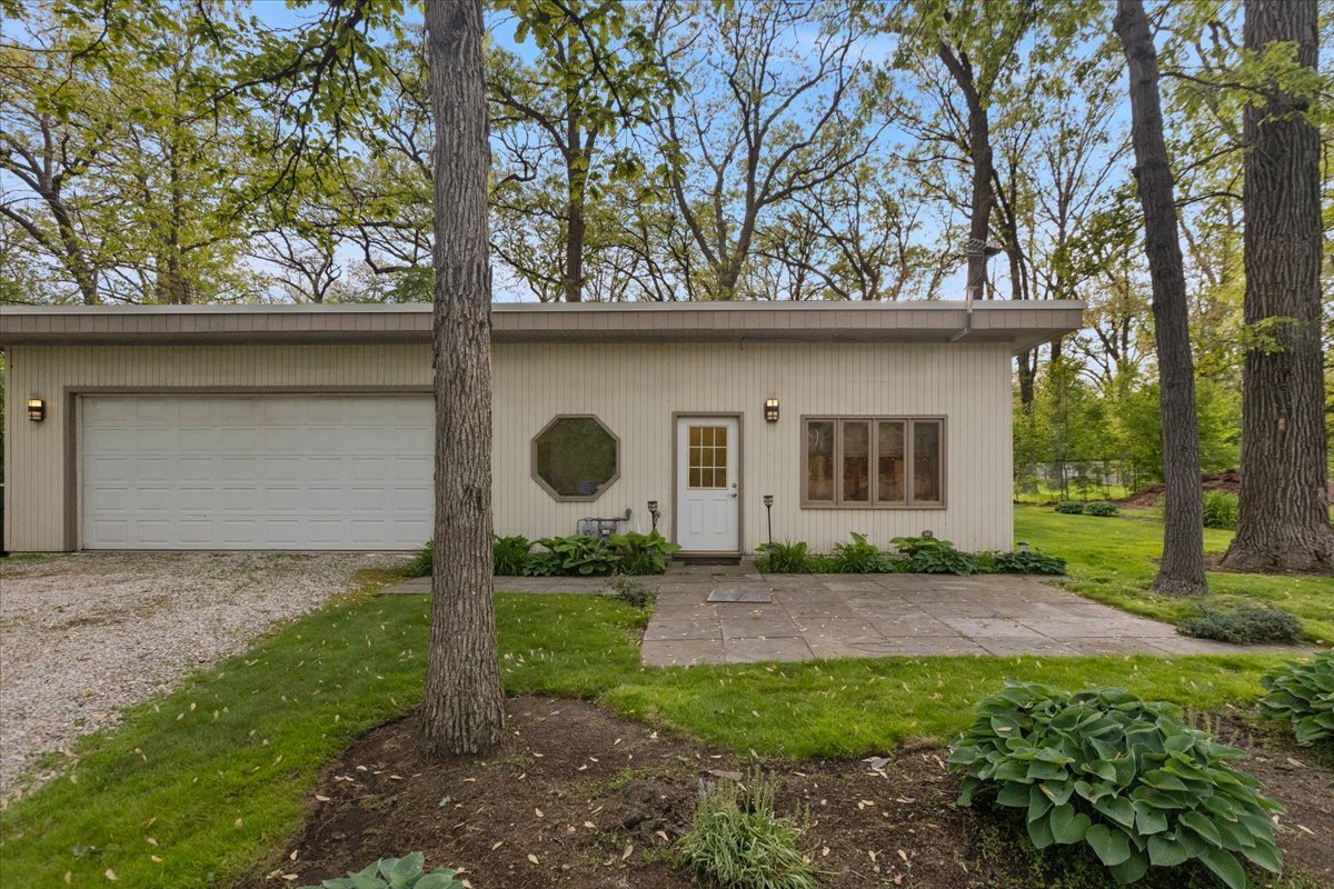 3464 Old Mill Road North Highland Park, IL 60035 - Photo 46 of 64 a view of a house with a yard and tree