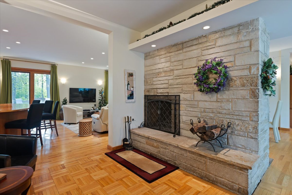3464 Old Mill Road North Highland Park, IL 60035 - Photo 7 of 64 a living room with furniture and a fireplace