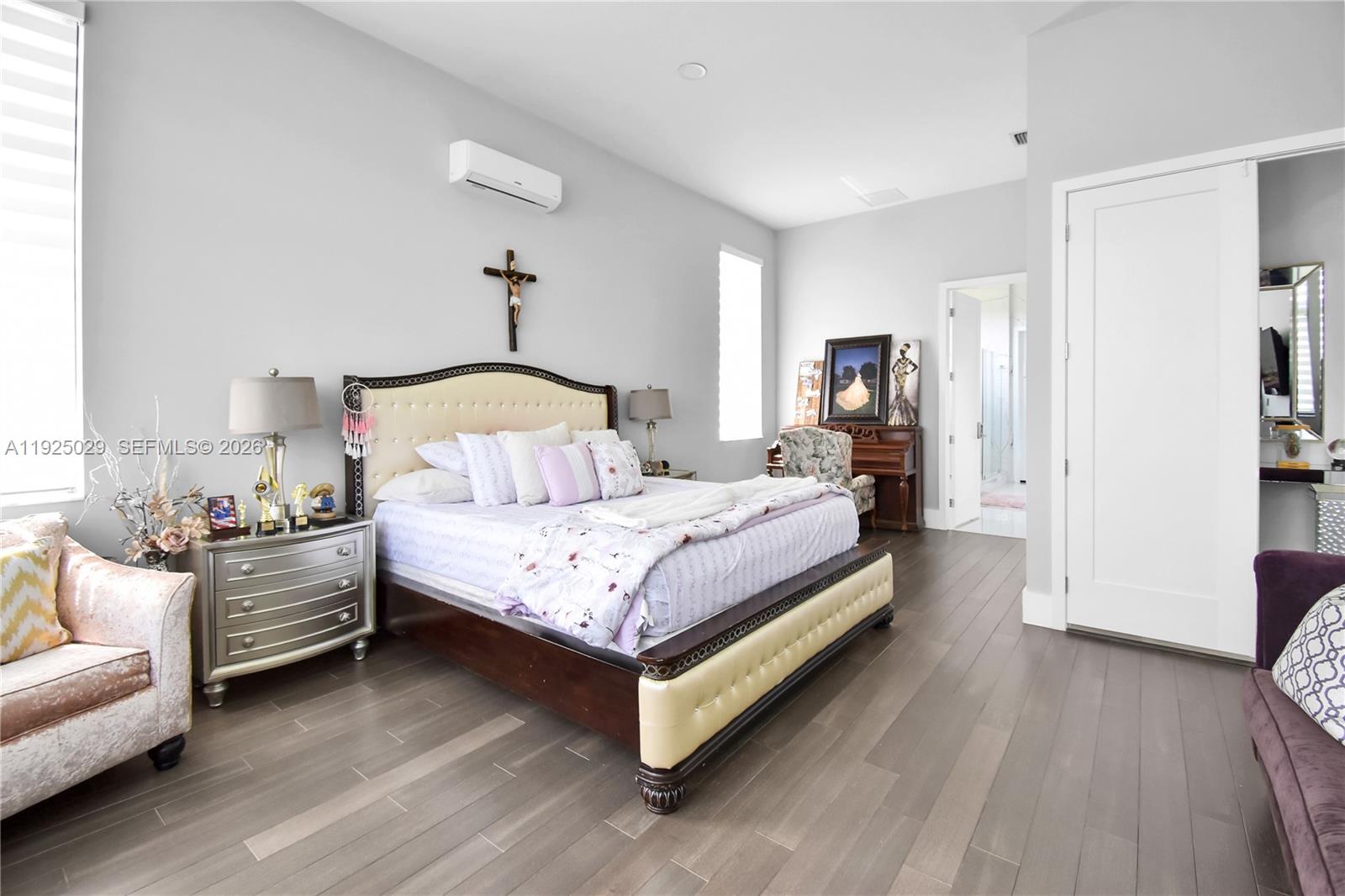 15846 Southwest 49th Street Southwest Ranches, FL 33331 - Photo 19 of 38 a bedroom with a bed couch and a view of kitchen