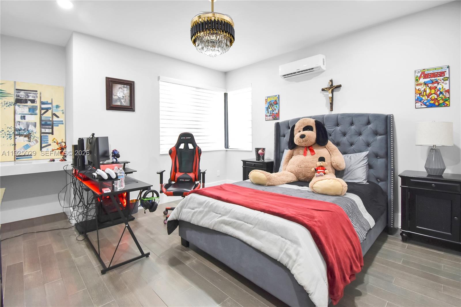 15846 Southwest 49th Street Southwest Ranches, FL 33331 - Photo 23 of 38 a bed room with a bed and a table