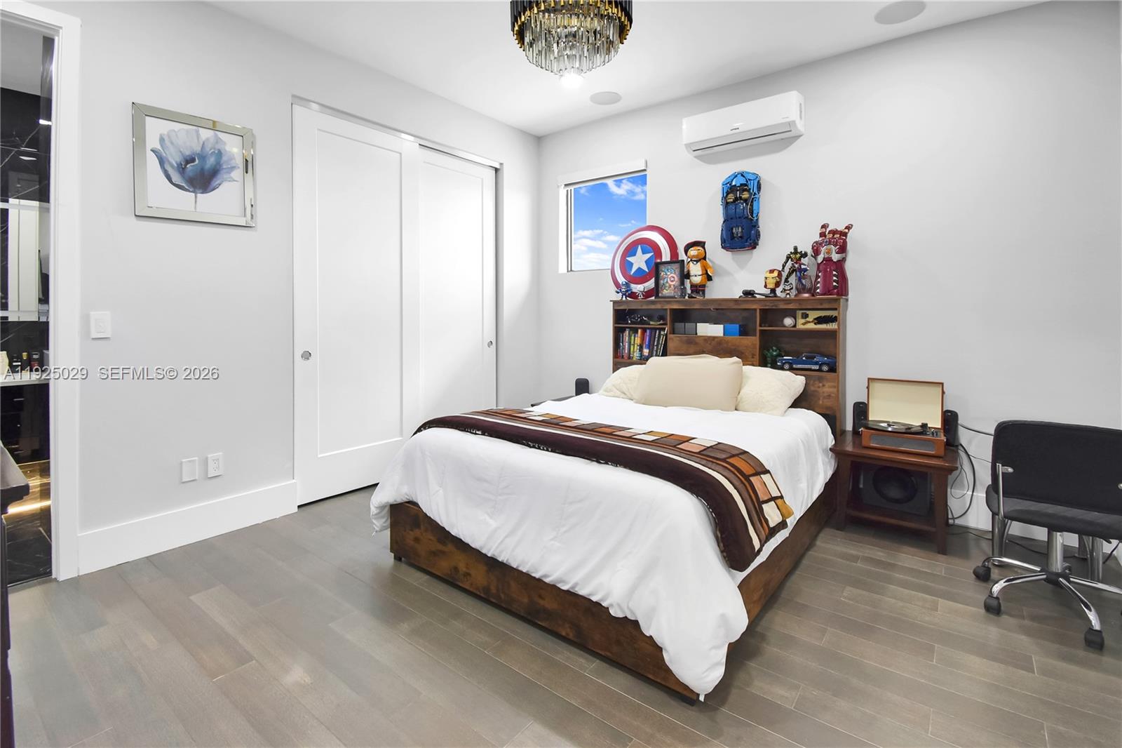 15846 Southwest 49th Street Southwest Ranches, FL 33331 - Photo 26 of 38 a bedroom with a bed and a desk