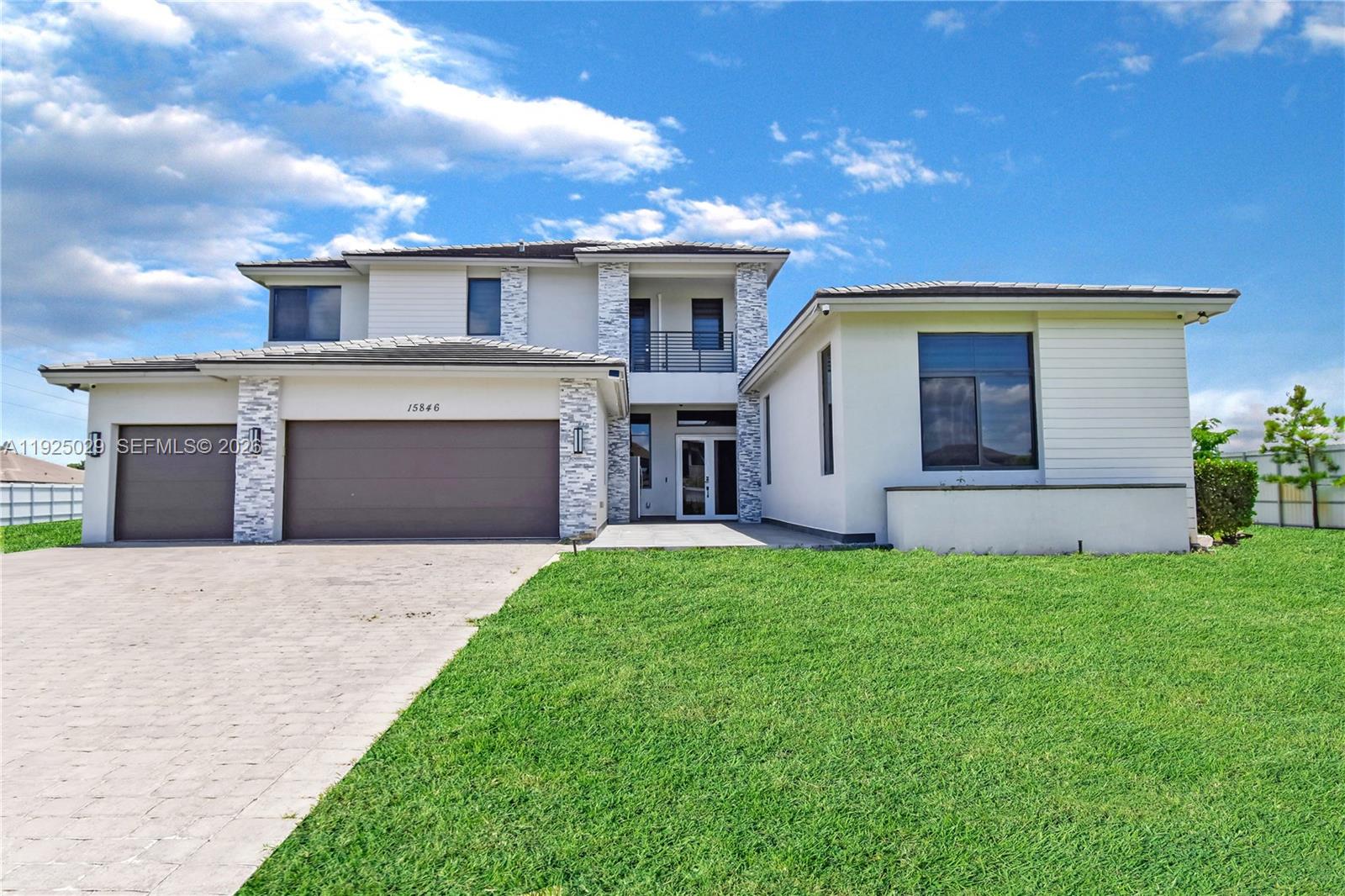 15846 Southwest 49th Street Southwest Ranches, FL 33331 - Photo 31 of 38 a front view of house with yard