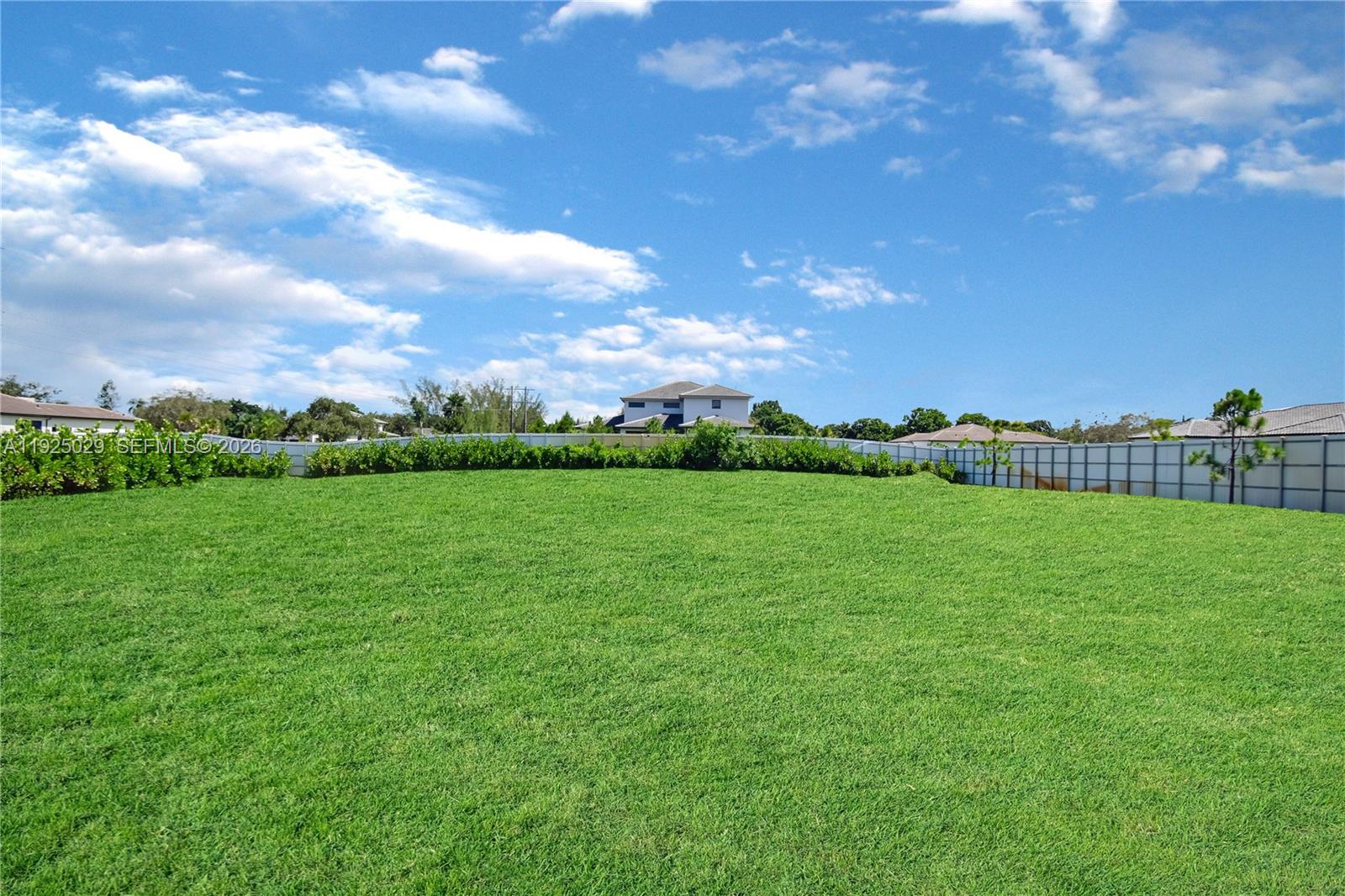 15846 Southwest 49th Street Southwest Ranches, FL 33331 - Photo 35 of 38 a view of a green field