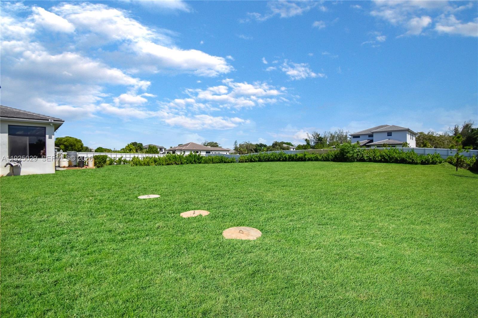 15846 Southwest 49th Street Southwest Ranches, FL 33331 - Photo 36 of 38 a green field with lots of green space