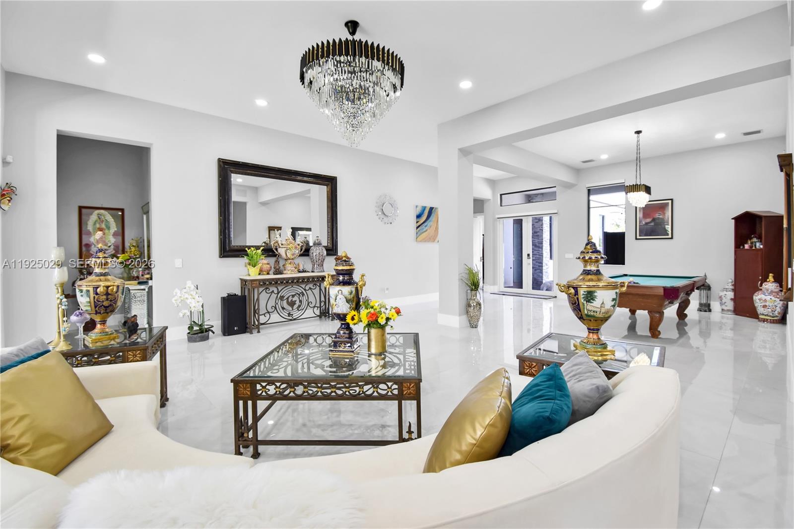 15846 Southwest 49th Street Southwest Ranches, FL 33331 - Photo 10 of 38 a living room with furniture and kitchen view