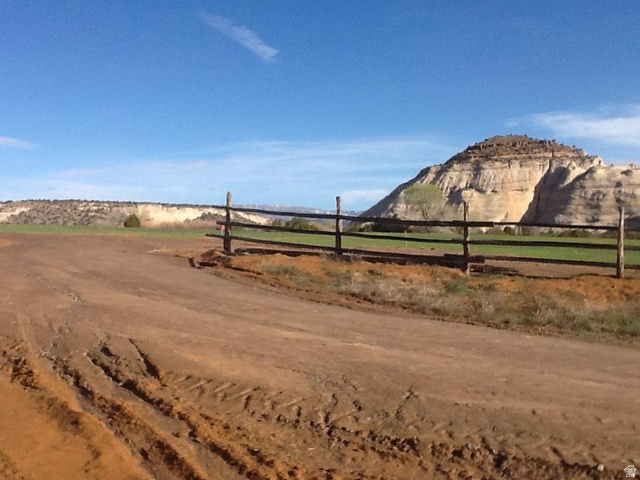1345 South 1070 East Boulder, UT 84716 - Photo 1 of 8 View of dirt / gravel road featuring a rural view and a mountain view
