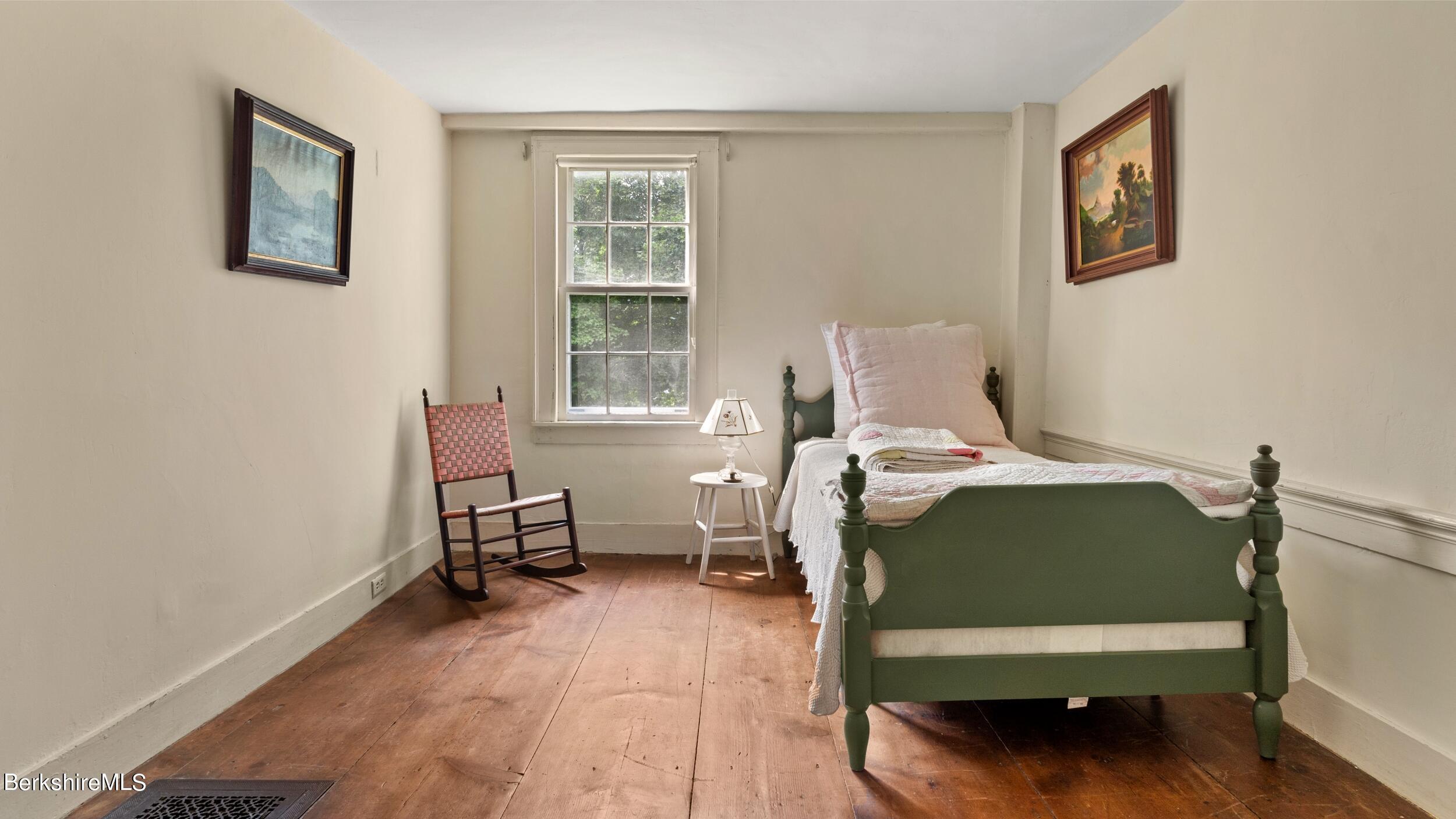 3 Church Road Tyringham, MA 01264 - Photo 35 of 53 a bedroom with a bed and a window