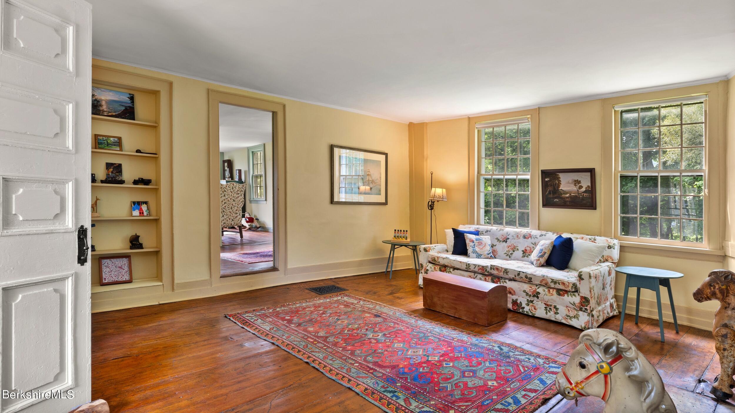 3 Church Road Tyringham, MA 01264 - Photo 37 of 53 a living room with furniture and a window