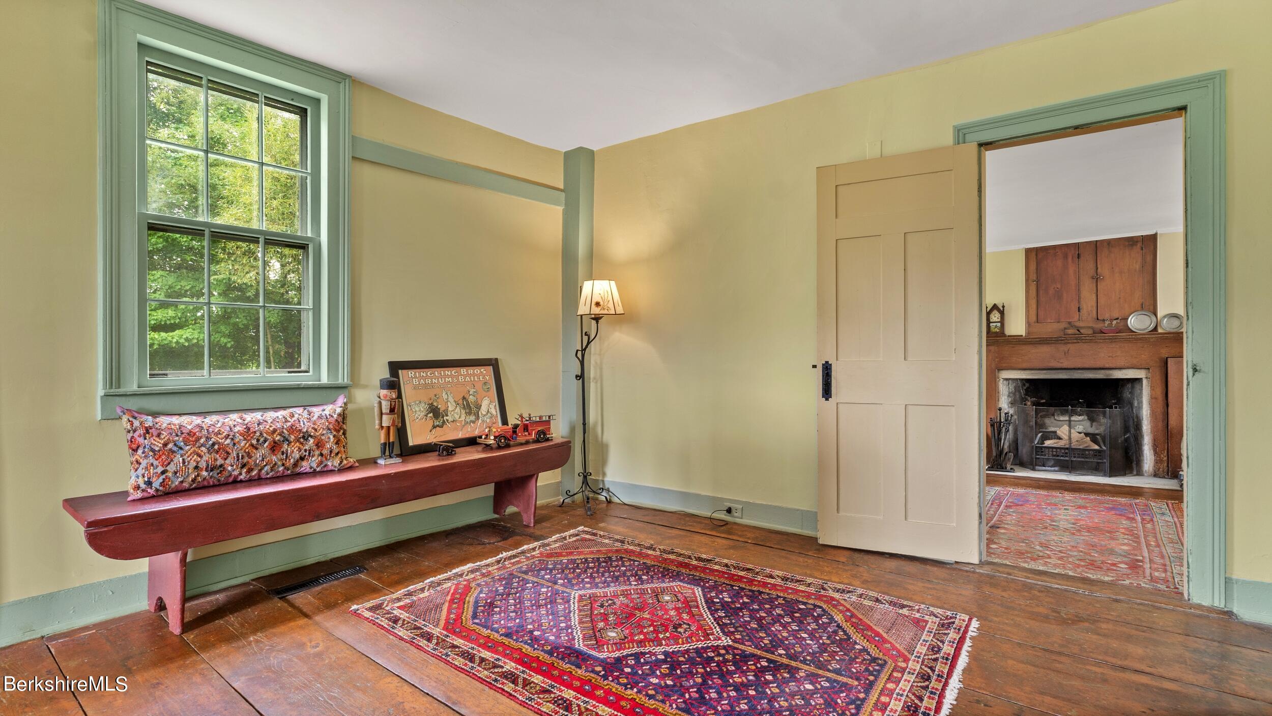 3 Church Road Tyringham, MA 01264 - Photo 6 of 53 a living room with furniture and a rug