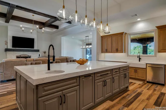 a kitchen with a cabinets and window