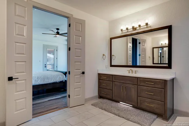 a bathroom with a bathtub and shower