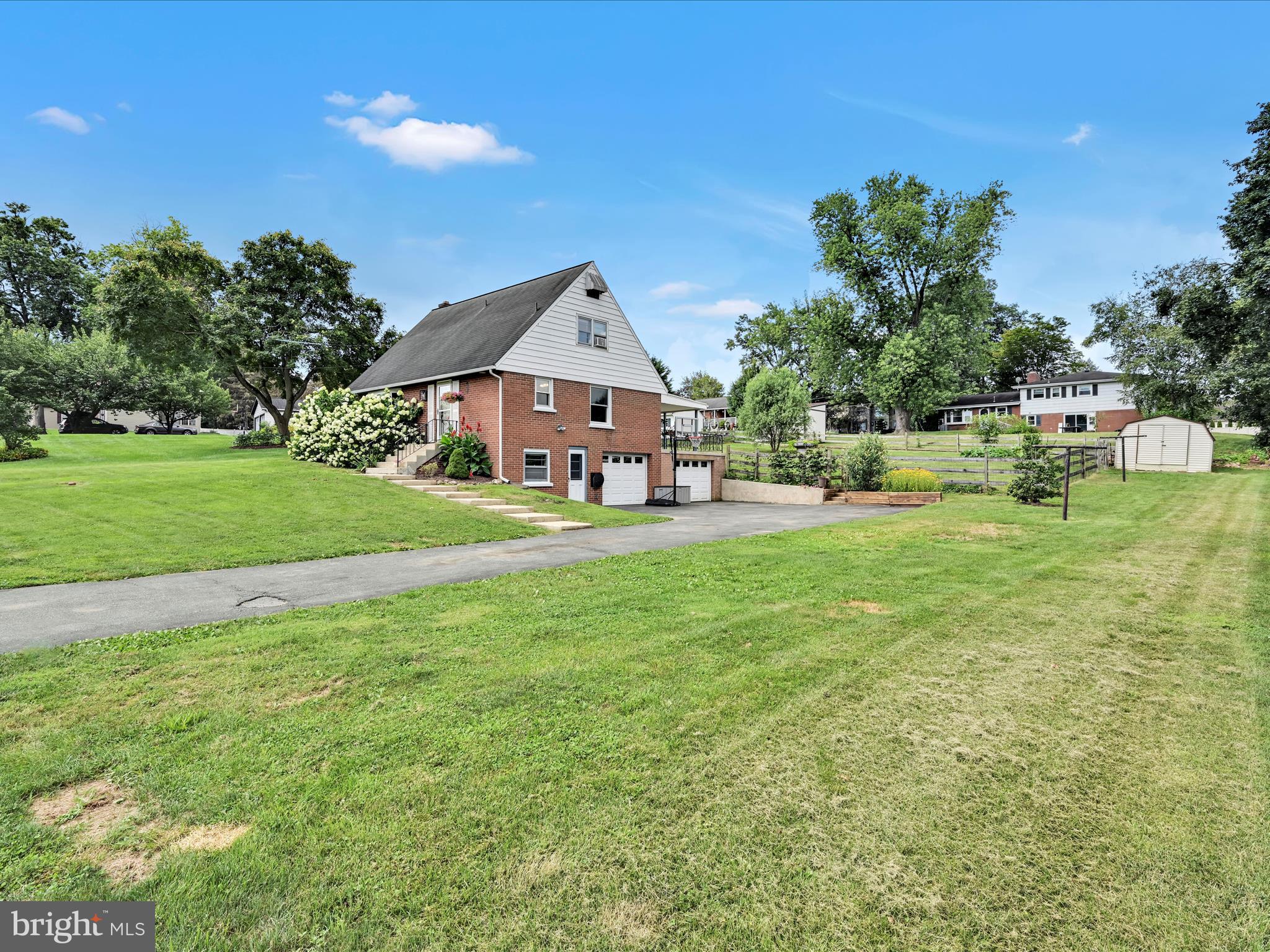 1774 Sammar Road Lancaster, PA 17601 - Photo 3 of 38 a front view of a house with garden