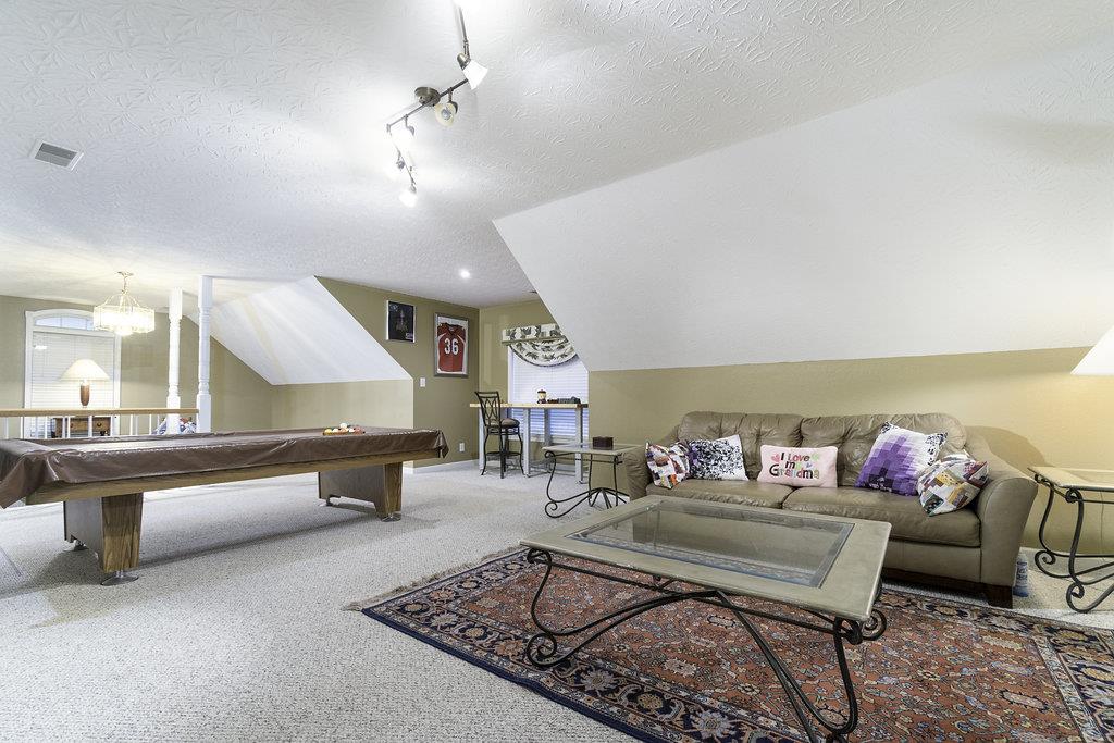 4010 Glen Raven Road Adams, TN 37010 - Photo 23 of 27 a living room with furniture and wooden floor