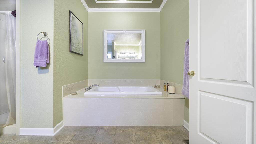 4010 Glen Raven Road Adams, TN 37010 - Photo 10 of 27 a bathroom with a sink and a bath tub